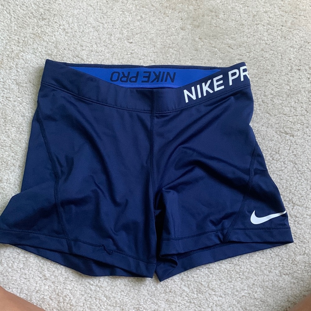 Navy blue Nike spandex. 2 inch inseams. Worn once and in new condition